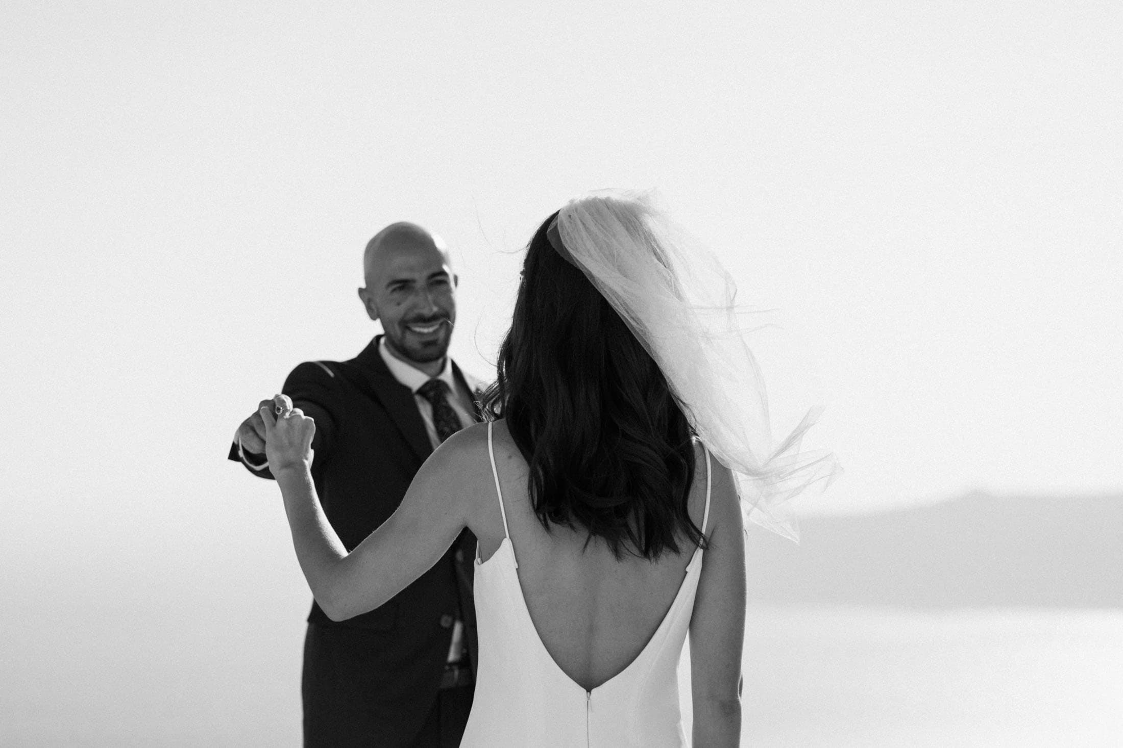 Miguel and Steffanie | emotions unfold in black and white Wedding Santorini-11