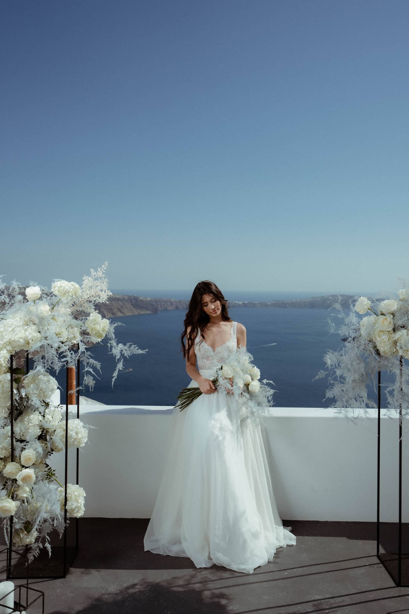 Wedding editorial photoshoot at Stella Rocca a mare. Wedding Santorini-8