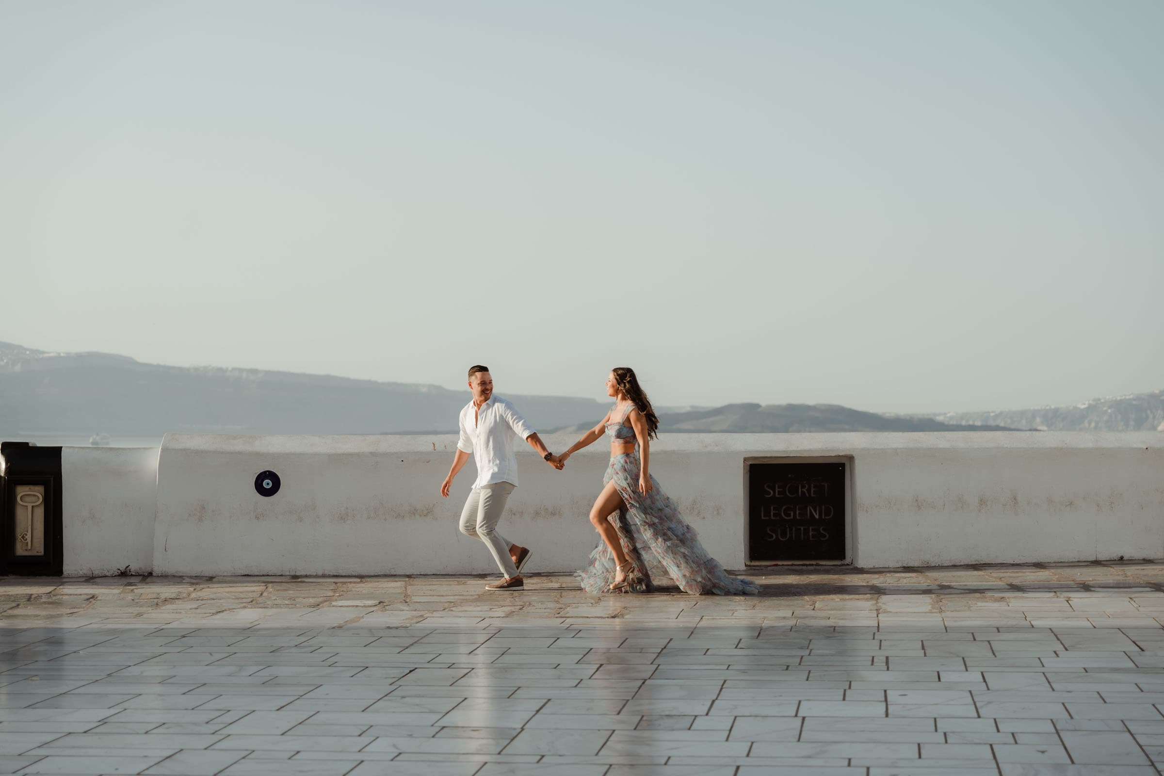Jake & Bella | proposal in Skaros rock Proposals in Santorini-55